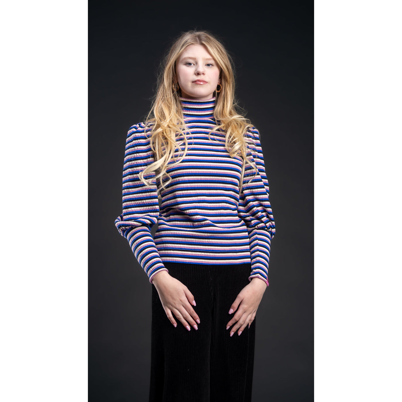 Elevate Your Wardrobe with the Evie Puff Sleeve Turtleneck: A Stylish and Versatile Essential